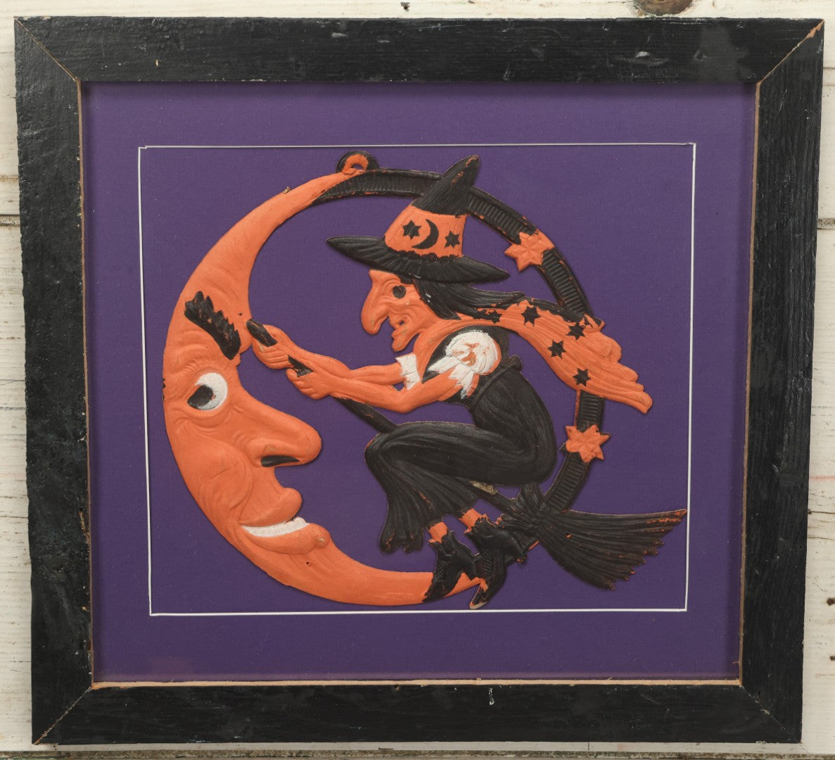 Lot 010 - Antique Witch On Broom With Moon Man Embossed Cardboard Paper Halloween Decoration, Made In Germany, In Custom Frame, 16-3/8" x 15-3/8"
