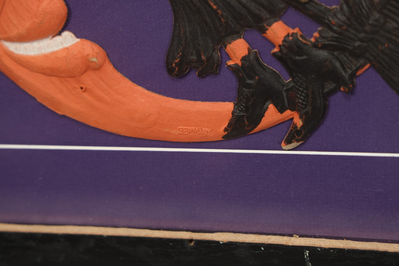 Lot 010 - Antique Witch On Broom With Moon Man Embossed Cardboard Paper Halloween Decoration, Made In Germany, In Custom Frame, 16-3/8" x 15-3/8"