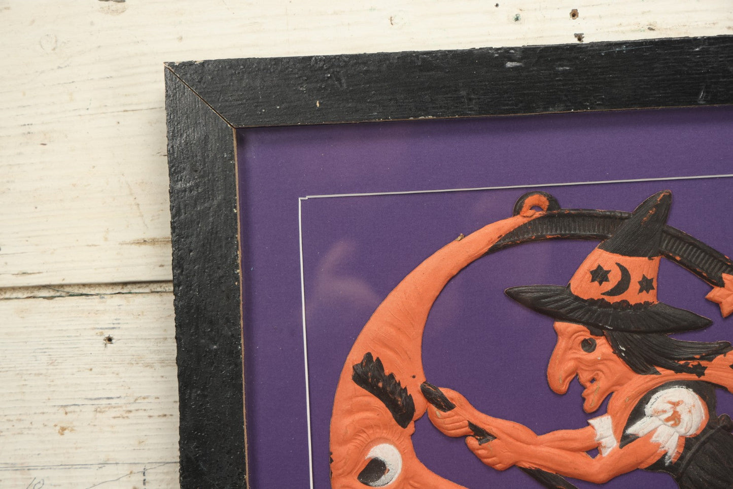 Lot 010 - Antique Witch On Broom With Moon Man Embossed Cardboard Paper Halloween Decoration, Made In Germany, In Custom Frame, 16-3/8" x 15-3/8"