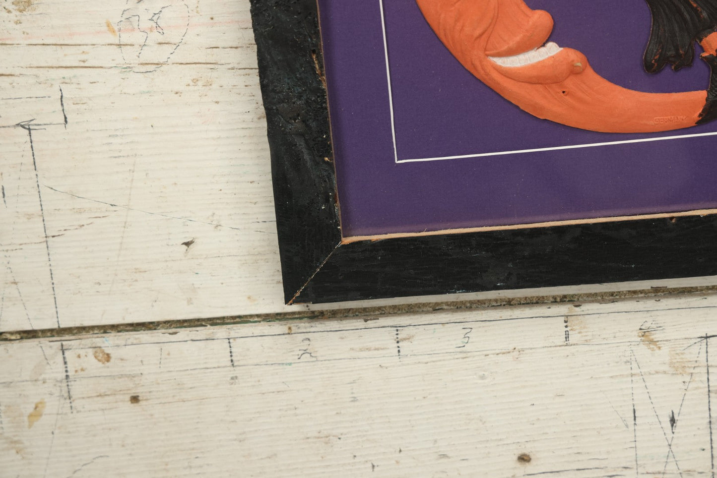 Lot 010 - Antique Witch On Broom With Moon Man Embossed Cardboard Paper Halloween Decoration, Made In Germany, In Custom Frame, 16-3/8" x 15-3/8"