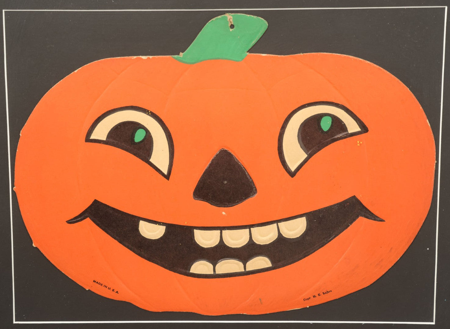 Lot 015 - Antique Halloween Pumpkin Jack-O-Lantern J.O.L. By H.E. Luhrs Embossed Cardboard Paper Halloween Decoration, Made In U.S.A., In Custom Frame, 17-1/4" x 14-3/8"