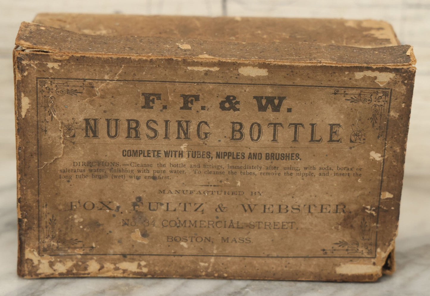 Lot 026 - Antique F.F. & W. Nursing Bottle, So-Called "Murder Bottle," In Original Box With Original Brush, Fox, Fultz, & Webster, Boston, Note Wear To Box, Chip To Bottle