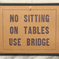 Lot 033 - Vintage Printed Pool Hall Sign On Press Board, "No Sitting On Tables, Use Bridge," Note Wear, In Frame, 14-7/8" x 11-3/8"