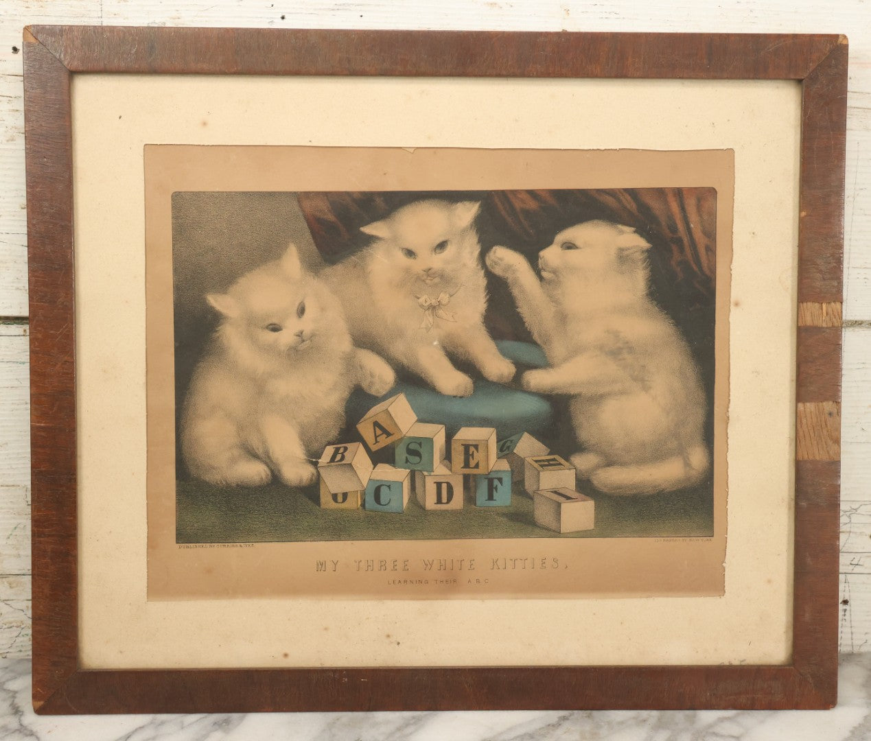 Lot 041 - Antique Hand Colored Lithograph Print Of "My Three White Kittens" Cats Playing With Blocks, "Learning Their A B C," Published By Currier & Ives, 19th Century, Note Frame Wear, 18-5/8" x 15-5/8"