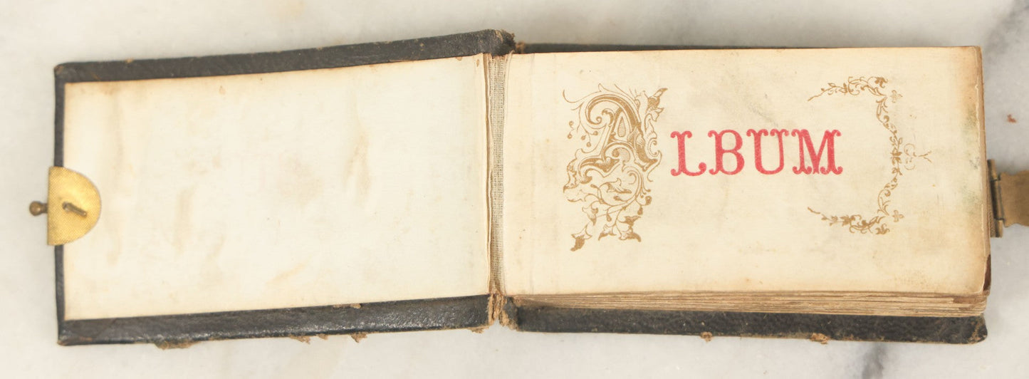 Lot 051 - Antique Gem Tintype Album With 46 Tintype Photographs Of Men, Women, And Children, Including Two "Not-So-Hidden" Mother Photographs