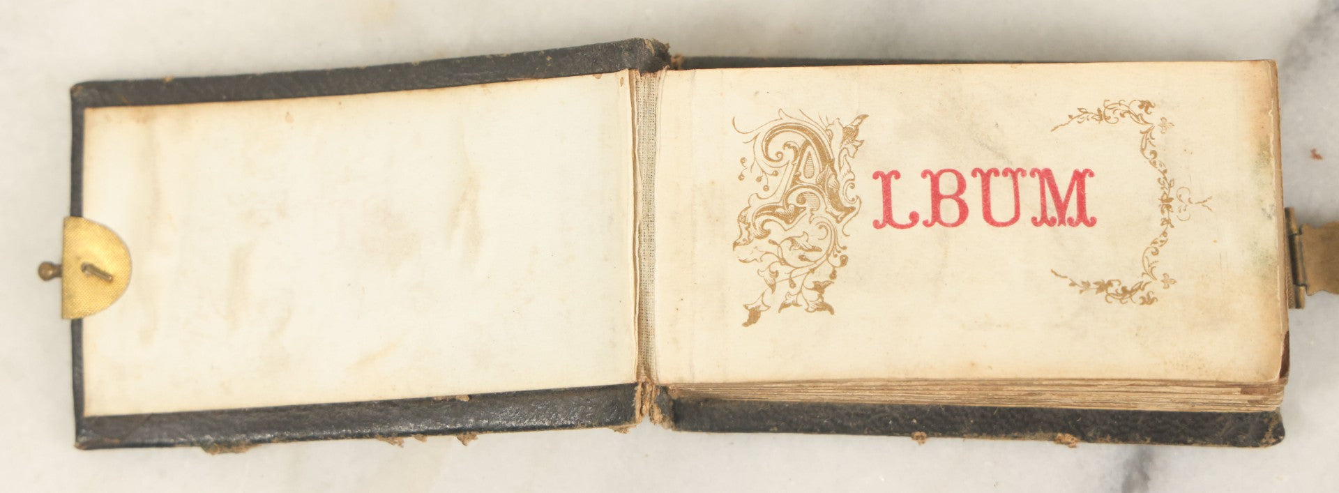 Lot 051 - Antique Gem Tintype Album With 46 Tintype Photographs Of Men, Women, And Children, Including Two "Not-So-Hidden" Mother Photographs