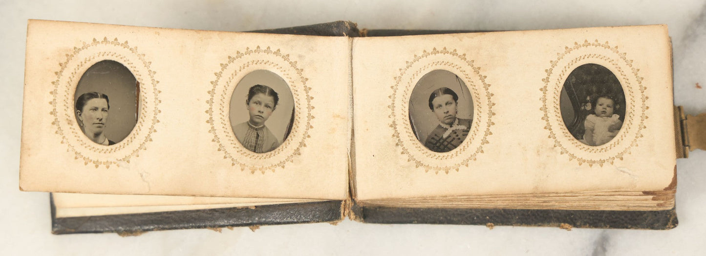 Lot 051 - Antique Gem Tintype Album With 46 Tintype Photographs Of Men, Women, And Children, Including Two "Not-So-Hidden" Mother Photographs