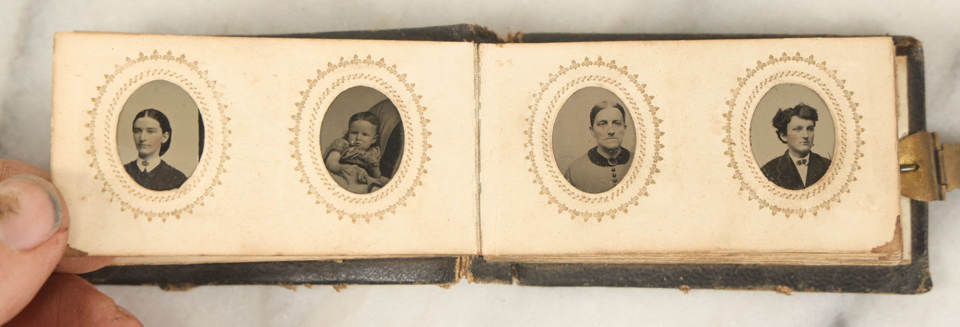 Lot 051 - Antique Gem Tintype Album With 46 Tintype Photographs Of Men, Women, And Children, Including Two "Not-So-Hidden" Mother Photographs