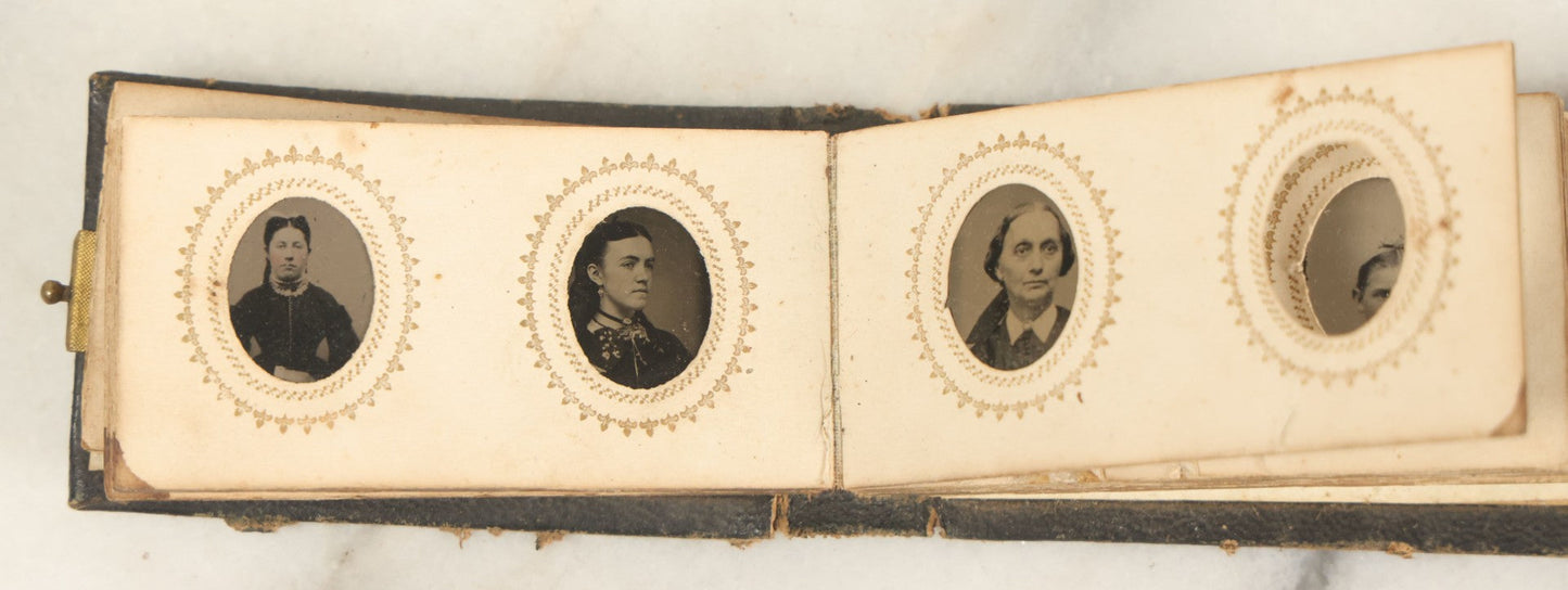 Lot 051 - Antique Gem Tintype Album With 46 Tintype Photographs Of Men, Women, And Children, Including Two "Not-So-Hidden" Mother Photographs
