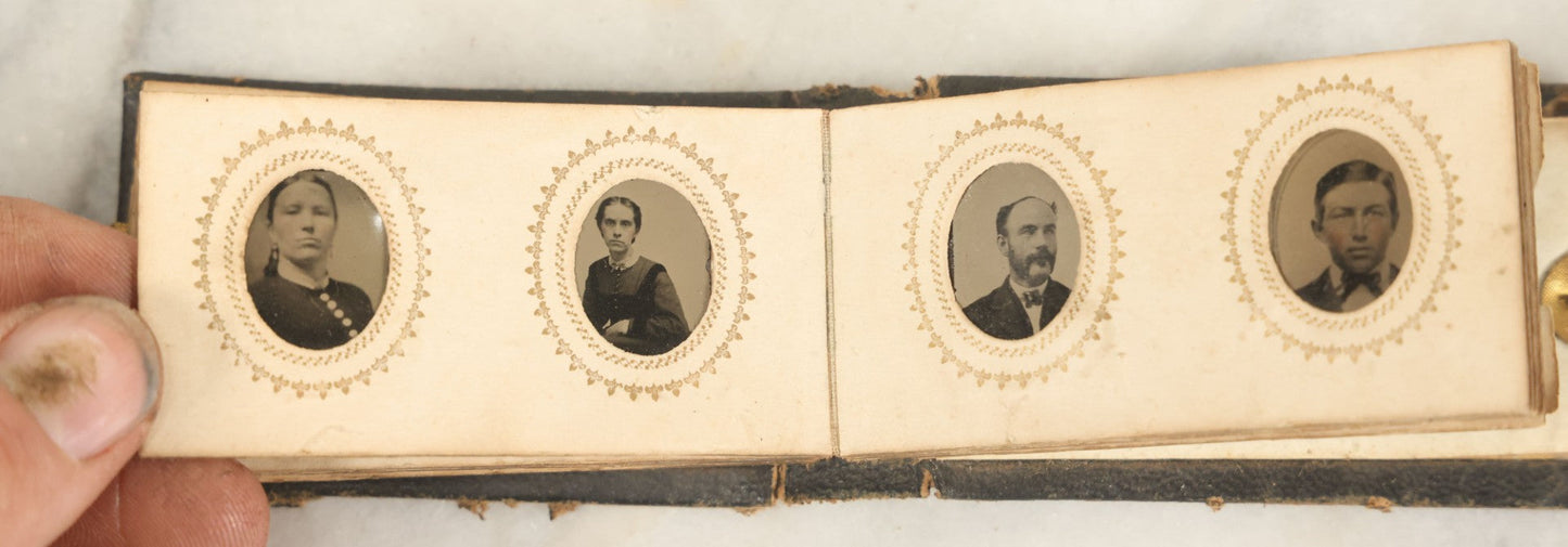 Lot 051 - Antique Gem Tintype Album With 46 Tintype Photographs Of Men, Women, And Children, Including Two "Not-So-Hidden" Mother Photographs