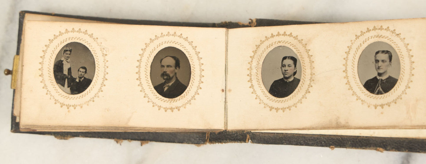 Lot 051 - Antique Gem Tintype Album With 46 Tintype Photographs Of Men, Women, And Children, Including Two "Not-So-Hidden" Mother Photographs
