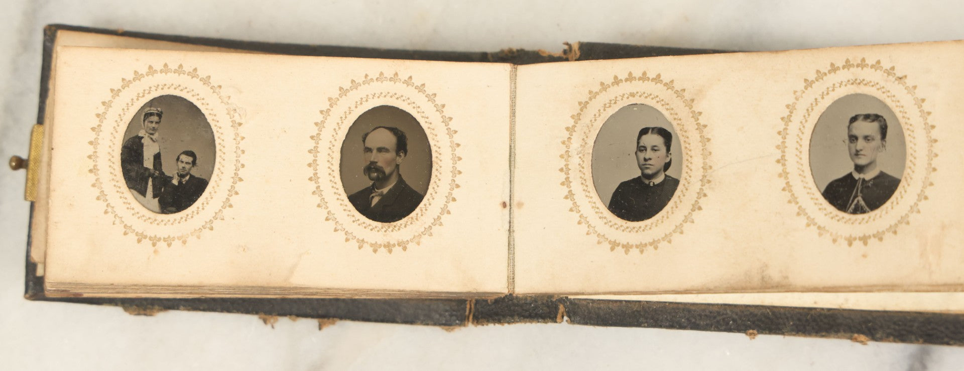 Lot 051 - Antique Gem Tintype Album With 46 Tintype Photographs Of Men, Women, And Children, Including Two "Not-So-Hidden" Mother Photographs