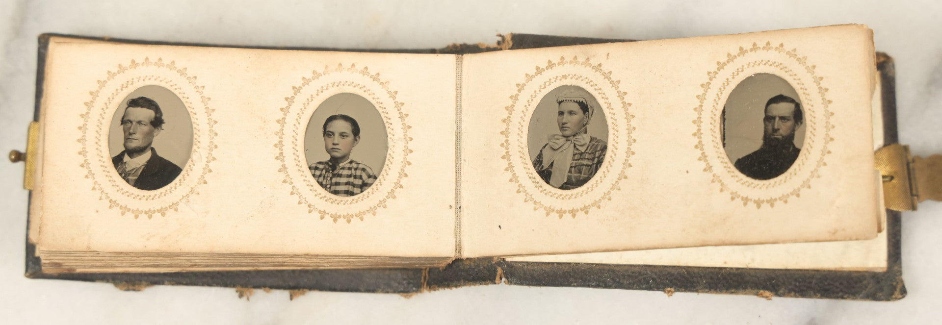 Lot 051 - Antique Gem Tintype Album With 46 Tintype Photographs Of Men, Women, And Children, Including Two "Not-So-Hidden" Mother Photographs