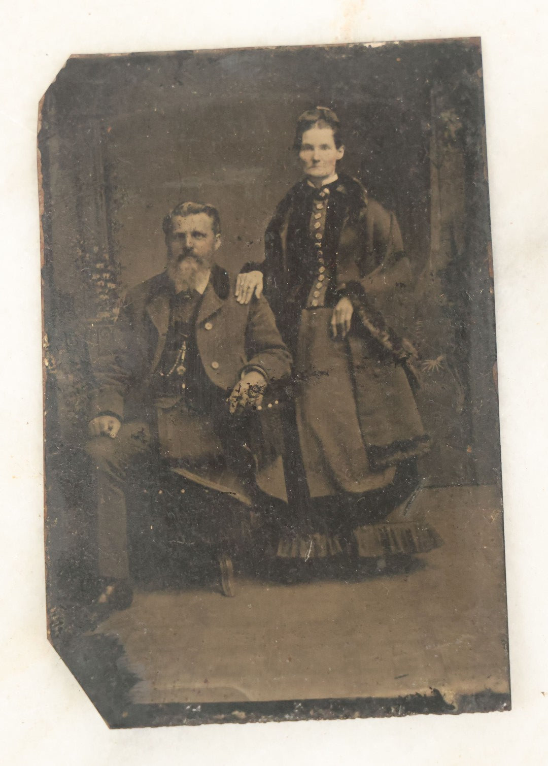 Lot 054 - Single Antique Tintype Photograph, Man With Amputated Leg Seated With Wife