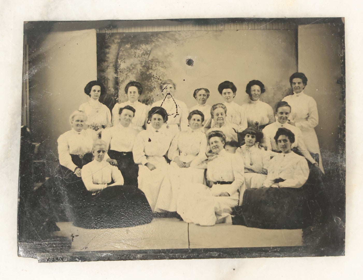 Lot 055 - Single Antique Tintype Photograph, Group Of Seventeen Women Dressed In White, Note Pin Hole, Top Center