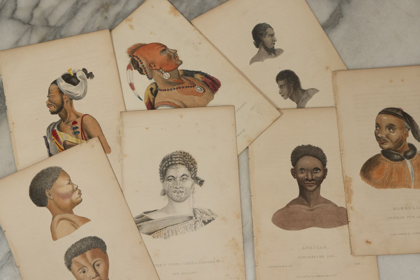 Lot 066 - Grouping Of 7 Antique Hand Colored And Other Engravings Of The Races Of Men, Including North American Indians, Africans, Mongolians, Etc., Circa 1827