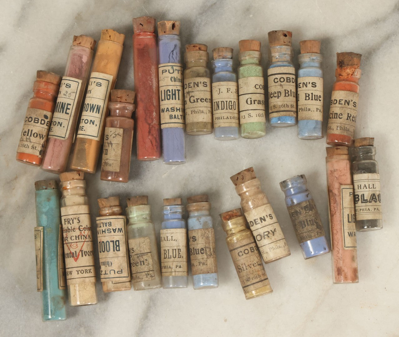 Lot 074 - Grouping Of 20+ Antique Glass Vial Bottles Of Various Paints And Pigments, Powders, By Various Manufacturers, As Found, With Paper Labels
