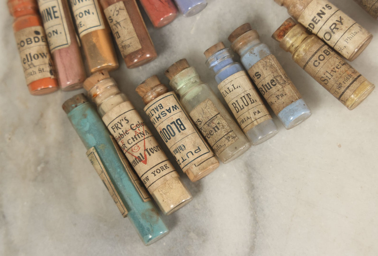 Lot 074 - Grouping Of 20+ Antique Glass Vial Bottles Of Various Paints And Pigments, Powders, By Various Manufacturers, As Found, With Paper Labels