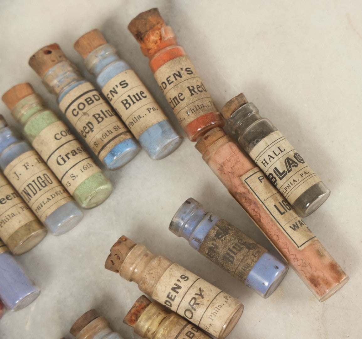 Lot 074 - Grouping Of 20+ Antique Glass Vial Bottles Of Various Paints And Pigments, Powders, By Various Manufacturers, As Found, With Paper Labels