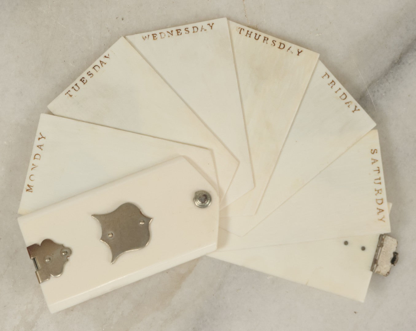 Lot 080 - Antique Miniature Day Of The Week Diary Made From Thin Sheets Of Bone, Page For Each Of The Week, Circa Mid 19th Century