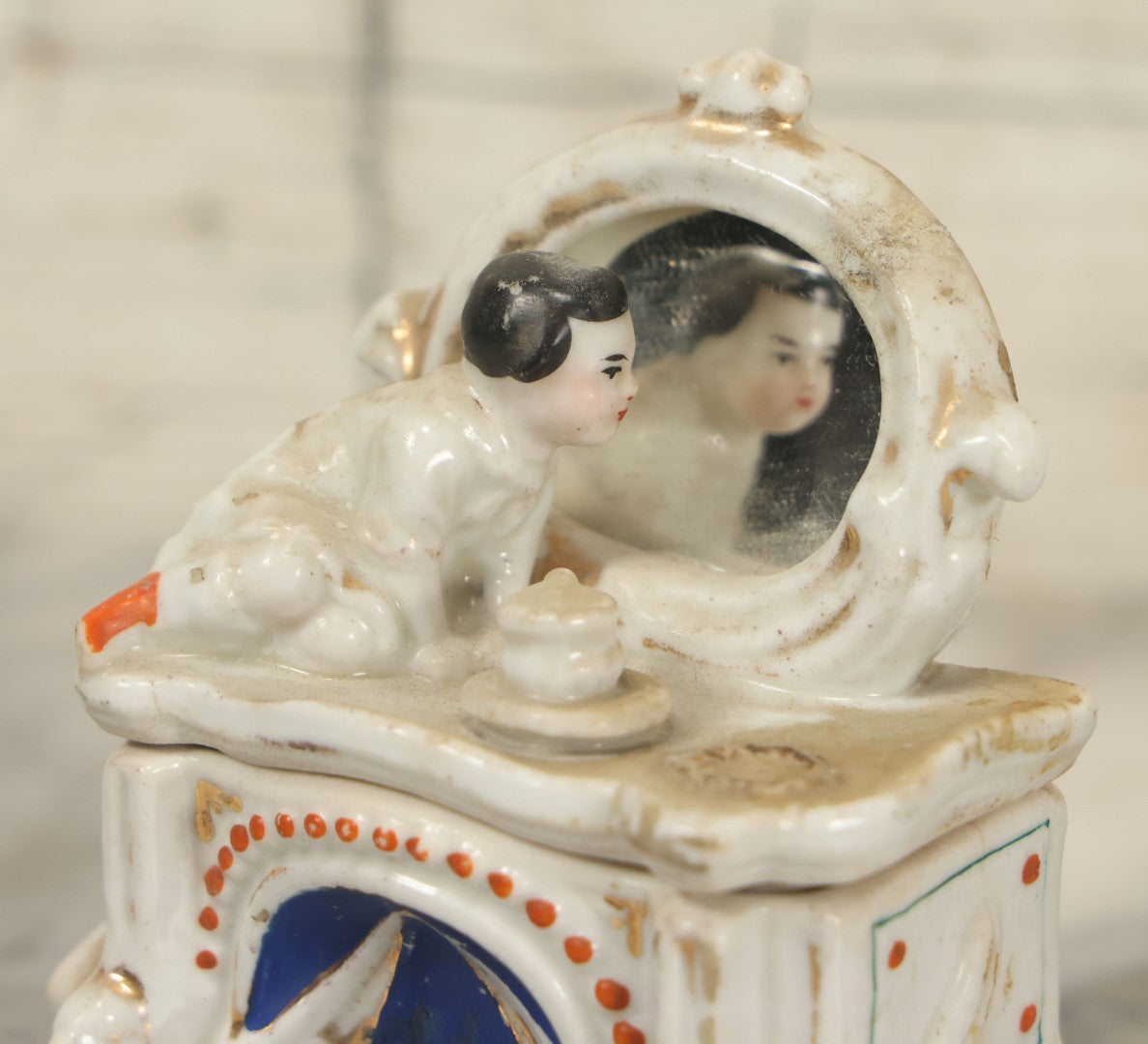 Lot 087 - Antique Porcelain Mini Box With Little Boy On Mantle With Mirror, Griffin Surrounds, Note Loss, Wear, Staining