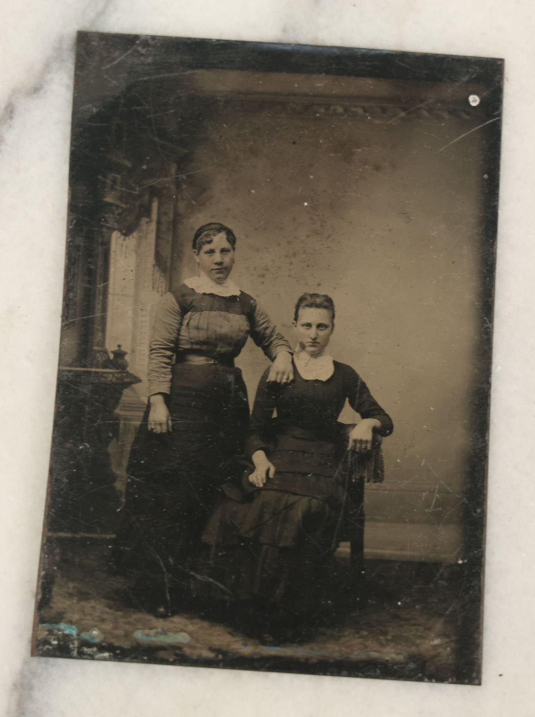 Lot 094 - Grouping Of Ten Tintypes Of Men, Women, And Children, Including Old Man With Beard, Man With Watch Chain, Boy Standing At Table, Others, Four With Paper Frames