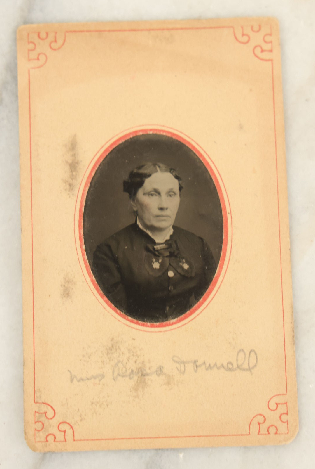 Lot 094 - Grouping Of Ten Tintypes Of Men, Women, And Children, Including Old Man With Beard, Man With Watch Chain, Boy Standing At Table, Others, Four With Paper Frames