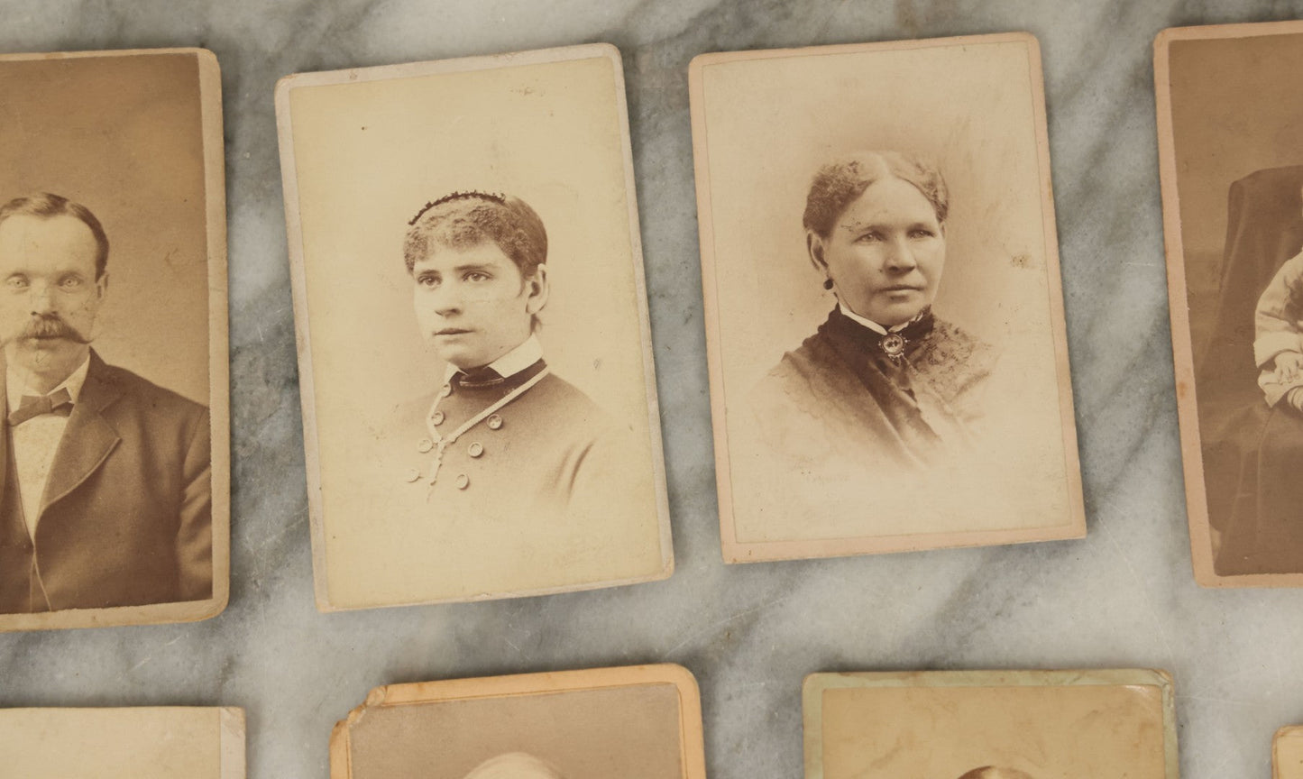 Lot 099 - Grouping Of Antique 15 Carte De Visite C.D.V. Photographs Of Men, Women, And Children, Including Woman With Cross, Man With Large Mustached, Seated Child, And Others