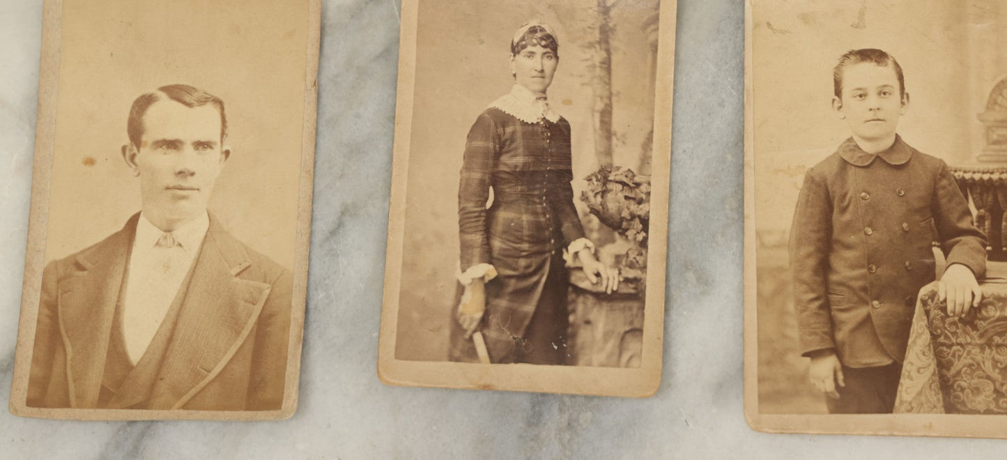 Lot 099 - Grouping Of Antique 15 Carte De Visite C.D.V. Photographs Of Men, Women, And Children, Including Woman With Cross, Man With Large Mustached, Seated Child, And Others