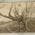 Lot 102 - Single Antique Real Photo Postcard, R.P.P.C., Man In Bowler Hat And Pinstripe Suit Standing With Bicycle, Bike, Dated 1910