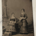 Lot 111 - Approximately Half Plate Antique Tintype Photograph Of Two Women, One Holding A Book With Illustrations
