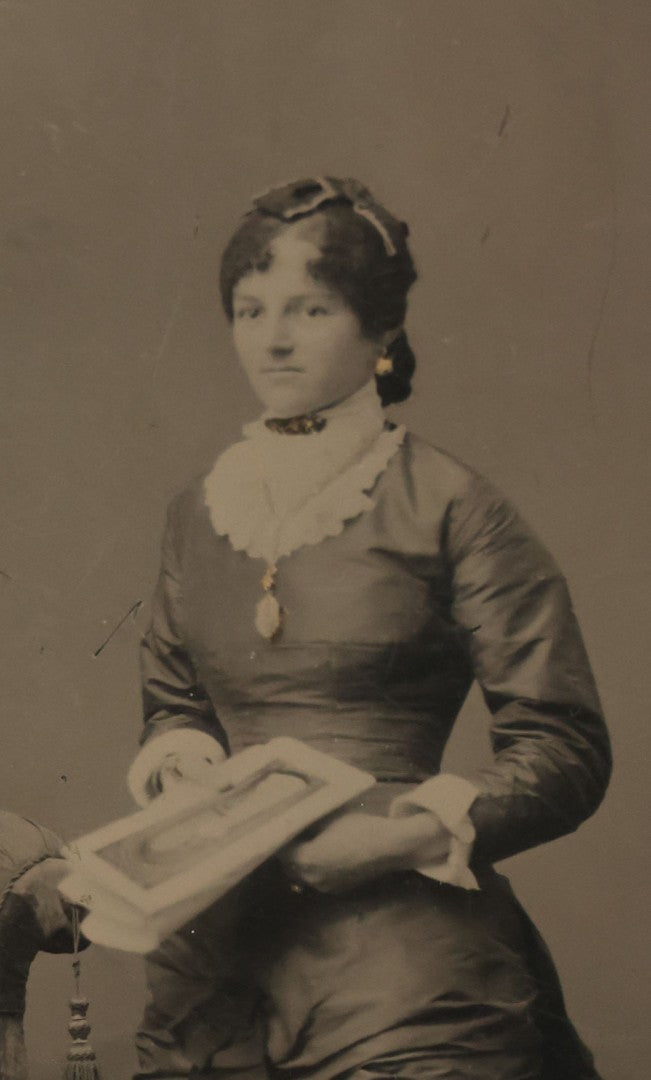 Lot 111 - Approximately Half Plate Antique Tintype Photograph Of Two Women, One Holding A Book With Illustrations
