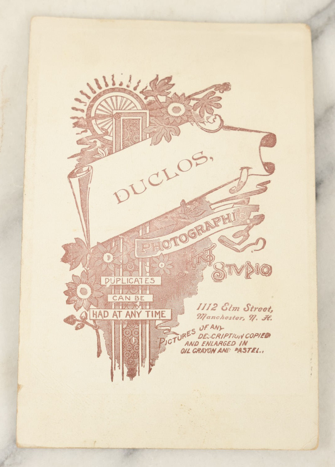 Lot 113 - Antique Photo Mounted On Cabinet Card (Not Original To Card) Of A Fraternal Memorial Parade, Possible Funeral, With Men In Hats, "In Memoriam" Sashes, Mark From Duclor Photographer, Manchester, New Hampshire