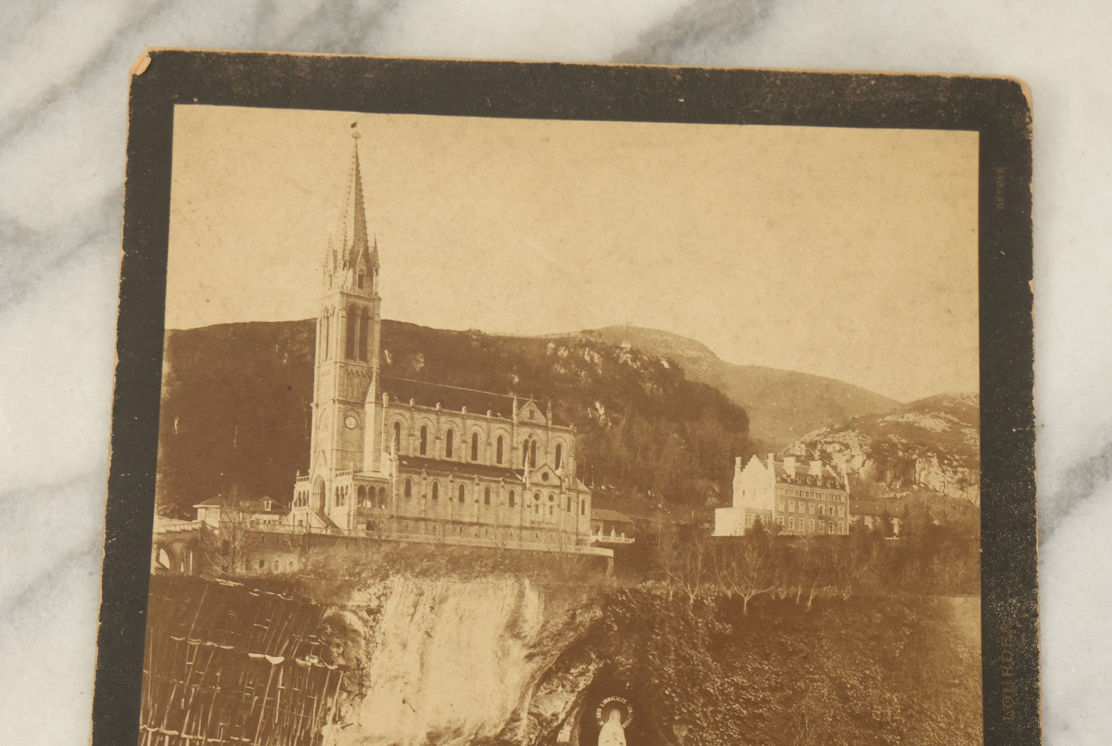 Lot 116 - Antique Boarded Photograph Of The Sanctuary Of Our Lady Of Lourdes, France, Marking The Site Of The 19th Century Marian Apparitions