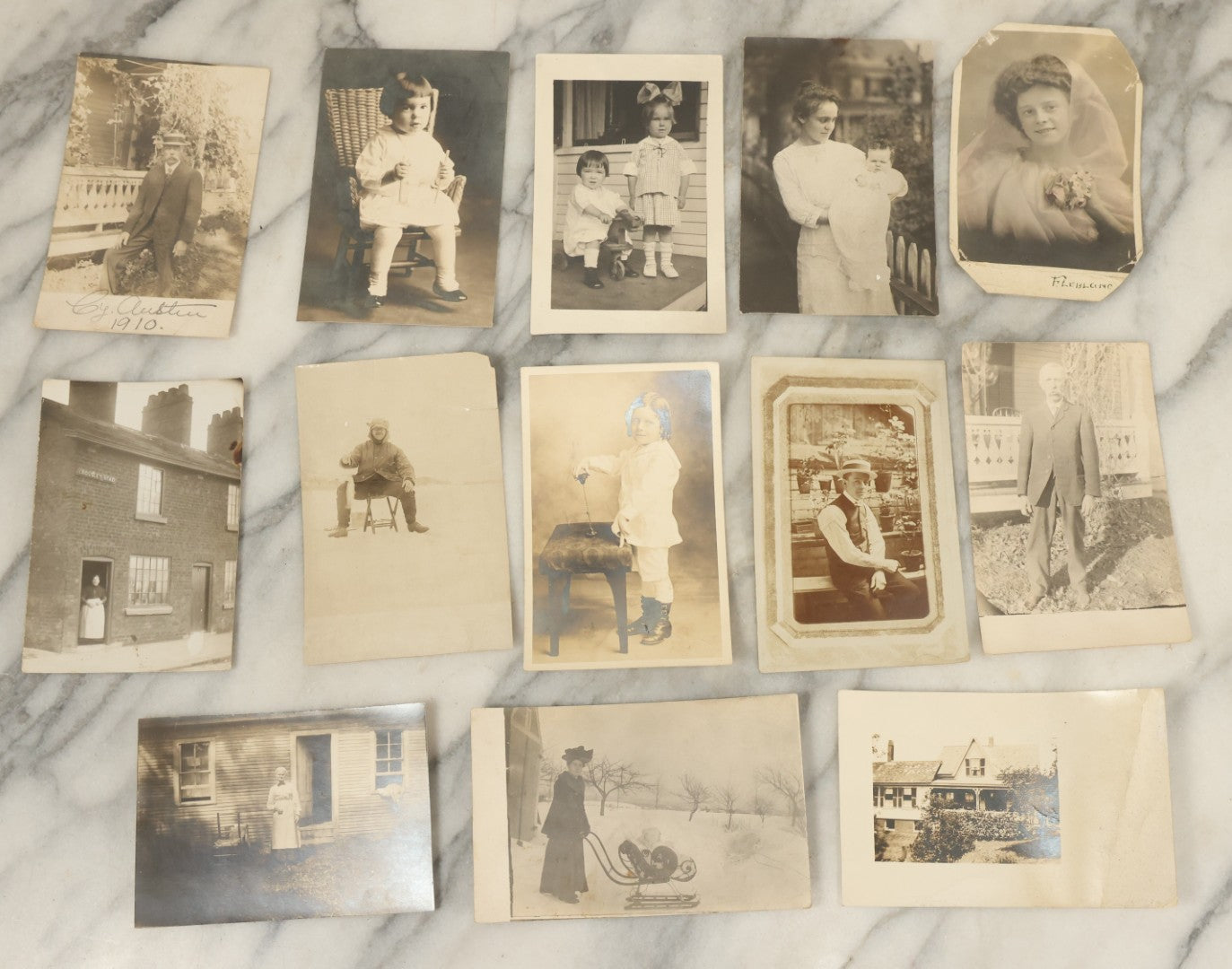 Lot 117 - Grouping Of Thirteen Antique Real Photo Postcards R.P.P.C. Including Man Fishing, Woman With Sled Pram, And Others
