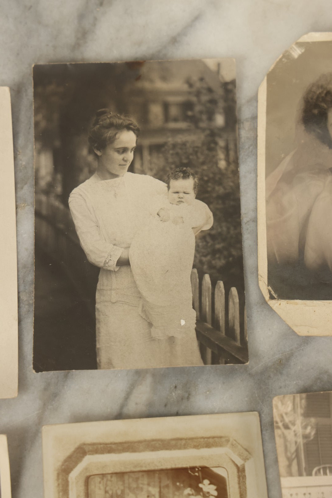 Lot 117 - Grouping Of Thirteen Antique Real Photo Postcards R.P.P.C. Including Man Fishing, Woman With Sled Pram, And Others