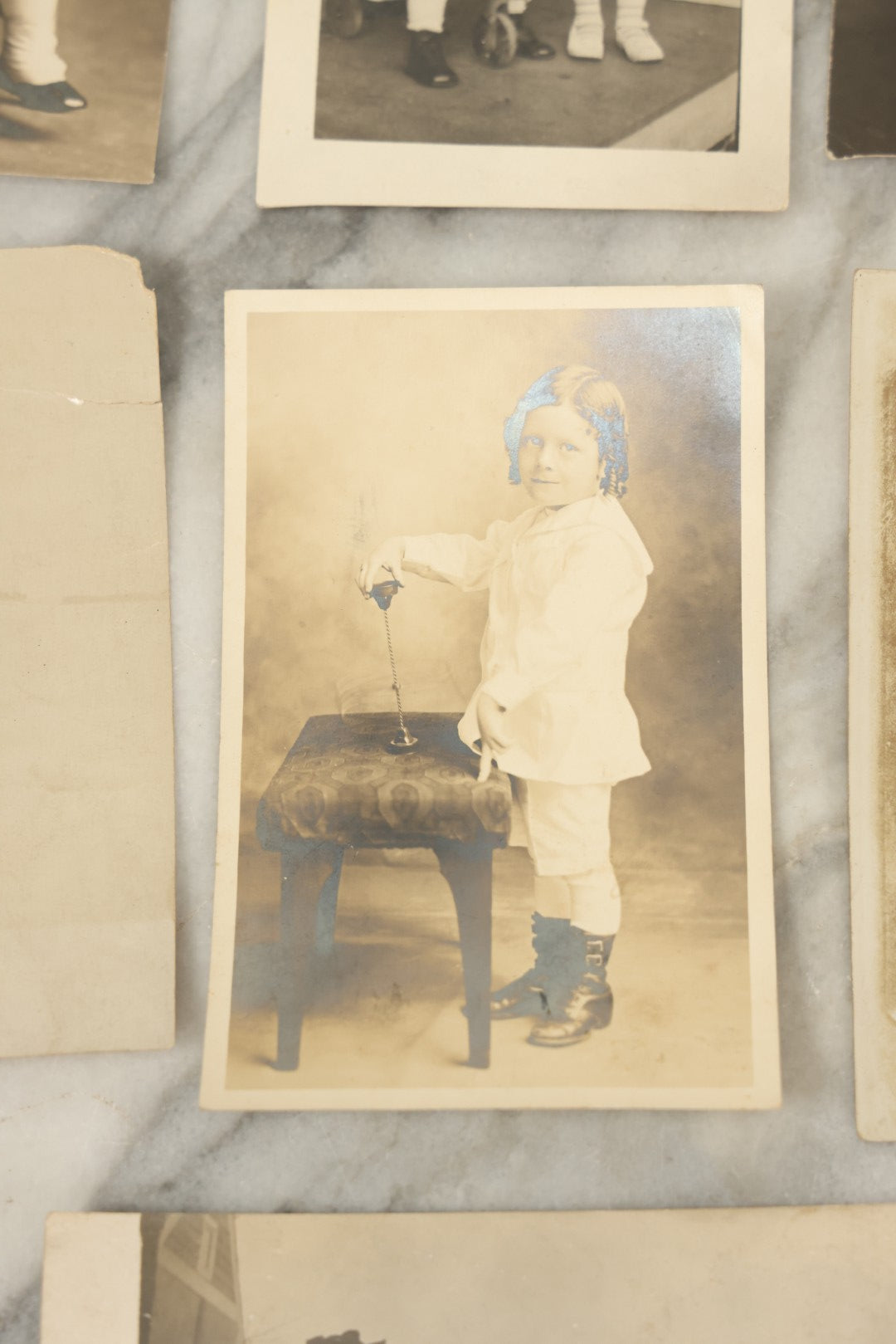 Lot 117 - Grouping Of Thirteen Antique Real Photo Postcards R.P.P.C. Including Man Fishing, Woman With Sled Pram, And Others