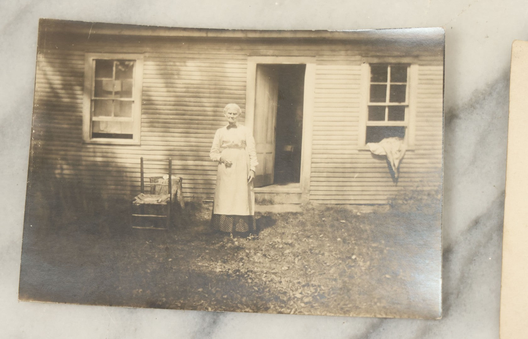 Lot 117 - Grouping Of Thirteen Antique Real Photo Postcards R.P.P.C. Including Man Fishing, Woman With Sled Pram, And Others
