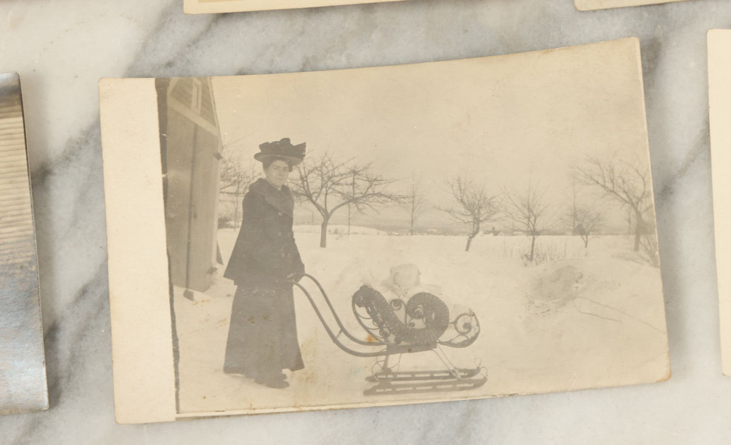 Lot 117 - Grouping Of Thirteen Antique Real Photo Postcards R.P.P.C. Including Man Fishing, Woman With Sled Pram, And Others
