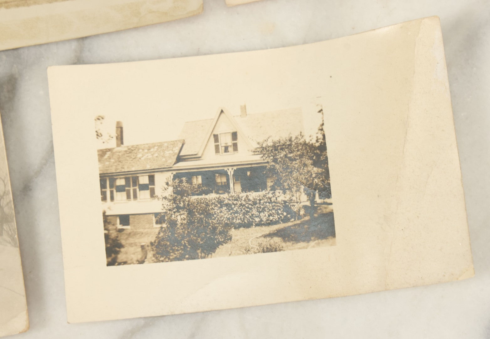 Lot 117 - Grouping Of Thirteen Antique Real Photo Postcards R.P.P.C. Including Man Fishing, Woman With Sled Pram, And Others