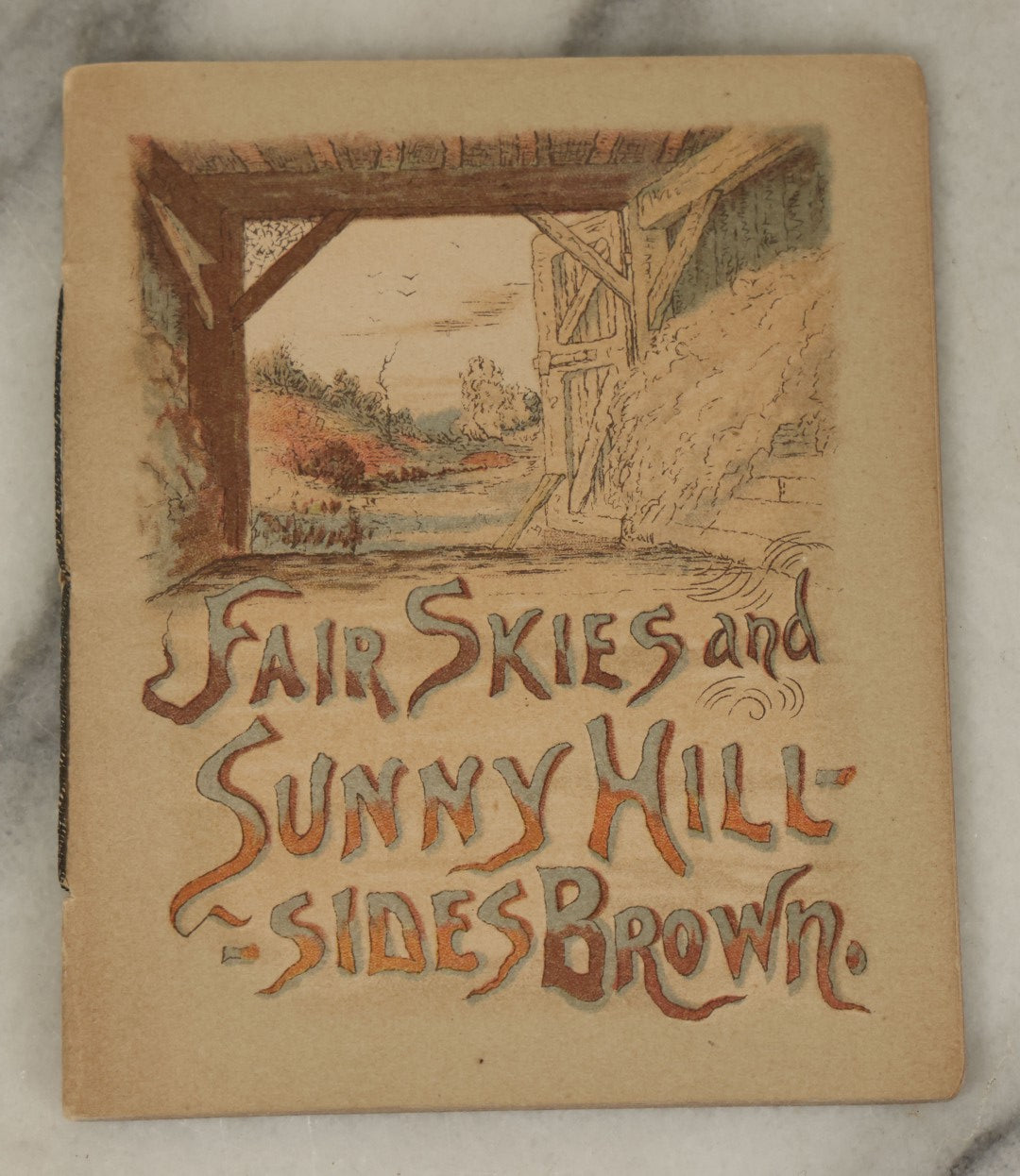 Lot 120 - Grouping Of Six Pieces Of Vintage And Antique Ephemera Including Wooden Postcards, Fair Skies Booklet, Advertising Calendar, And More