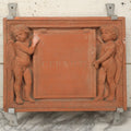 Lot 004 - Vintage Cast Terracotta Relief Family Grave Marker Plaque, Cerruti Family, With Cherubs On Either Side, Including Metal Brackets, Note Repairs, Heavy Damage, 19" x 19-7/8"