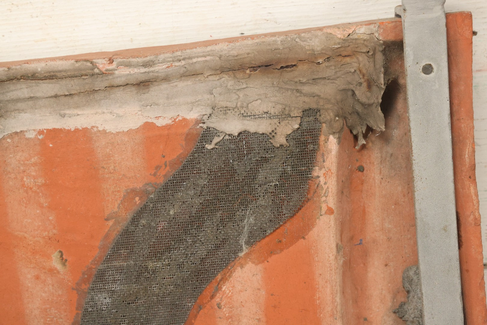 Lot 004 - Vintage Cast Terracotta Relief Family Grave Marker Plaque, Cerruti Family, With Cherubs On Either Side, Including Metal Brackets, Note Repairs, Heavy Damage, 19" x 19-7/8"