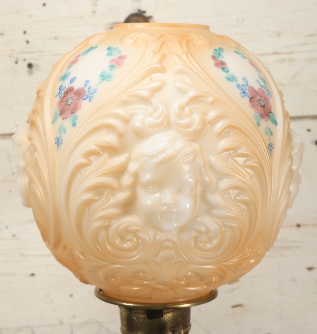 Lot 006 - Antique Victorian Electrified Gone With The Wind Oil Lamp With Ornate Metal Base & Embossed Cherub Glass Globe, Note Cracks, Repairs To Globe, Working Condition, Approximately 26" Overall Height