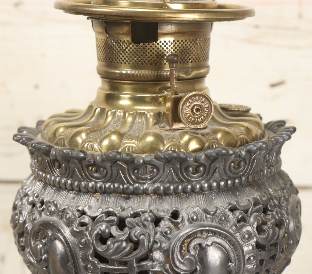 Lot 006 - Antique Victorian Electrified Gone With The Wind Oil Lamp With Ornate Metal Base & Embossed Cherub Glass Globe, Note Cracks, Repairs To Globe, Working Condition, Approximately 26" Overall Height