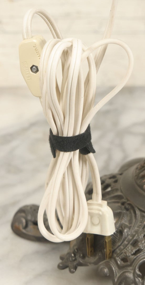 Lot 006 - Antique Victorian Electrified Gone With The Wind Oil Lamp With Ornate Metal Base & Embossed Cherub Glass Globe, Note Cracks, Repairs To Globe, Working Condition, Approximately 26" Overall Height