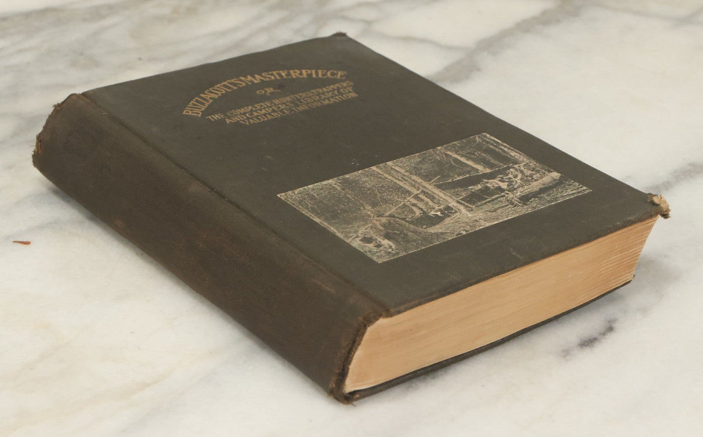 Lot 122 - "Buzzacott's Masterpiece Or The Complete Hunters', Trappers', And Campers' Library Of Valuable Information" Antique Book With Photos By "Buzzacott," Mcmains & Meyer Publishers, 1913