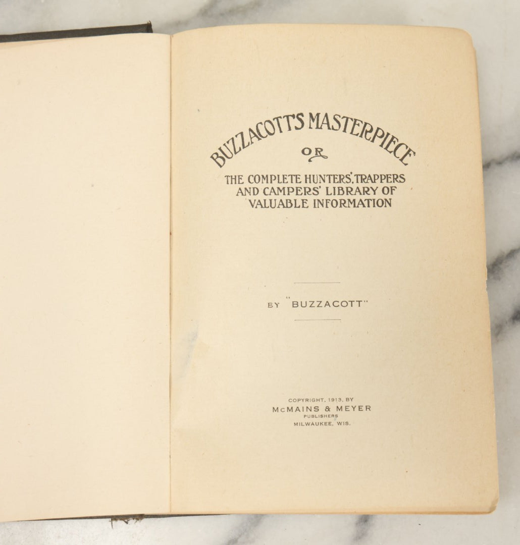 Lot 122 - "Buzzacott's Masterpiece Or The Complete Hunters', Trappers', And Campers' Library Of Valuable Information" Antique Book With Photos By "Buzzacott," Mcmains & Meyer Publishers, 1913