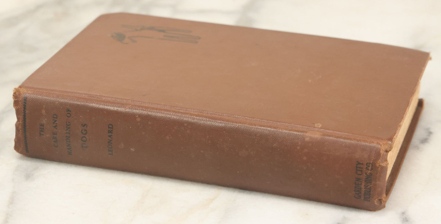 Lot 124 - "The Care And Handling Of Dogs" Vintage Book By John Lynn Leonard, Illustrated With Thirty-Five Photographic Studies, Garden City Publishing Company, Garden City, New York, 1928