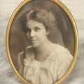 Lot 127 - Antique Framed Portrait Photo Of A Pretty Young Smiling Woman In A Brass Frame By John Wanamaker, 4-1/4" x 5-5/8"